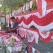 Pedagang Bendera Merah Putih Warnai Jalan Transmigrasi Tanah Bumbu Jelang HUT RI ke-80